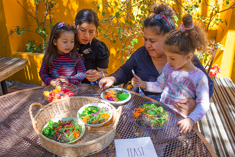 FEAST participants enjoy a meal