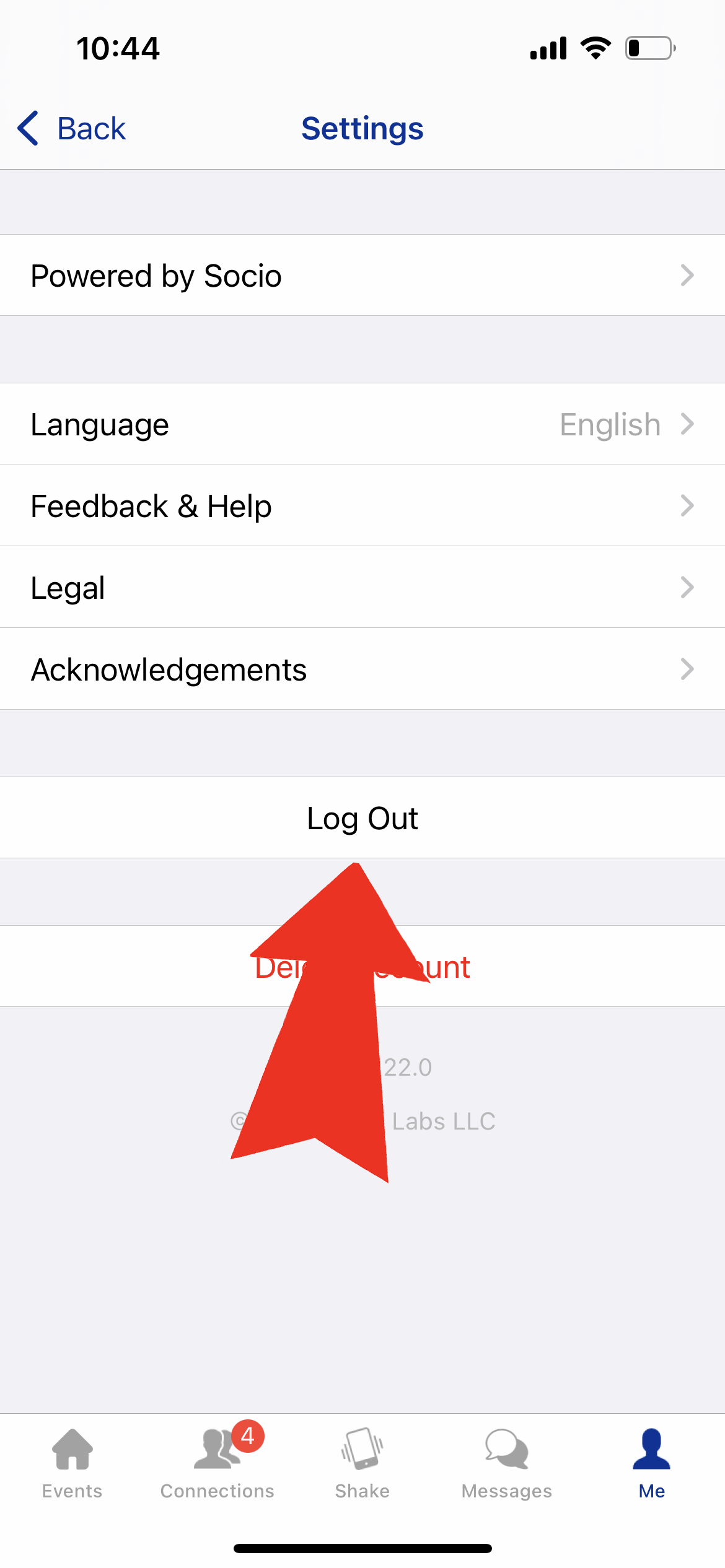Screenshot of the Settings screen of the app with an arrow pointing to the Log Out button