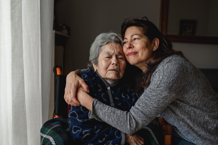 a female caregiver with her older family member