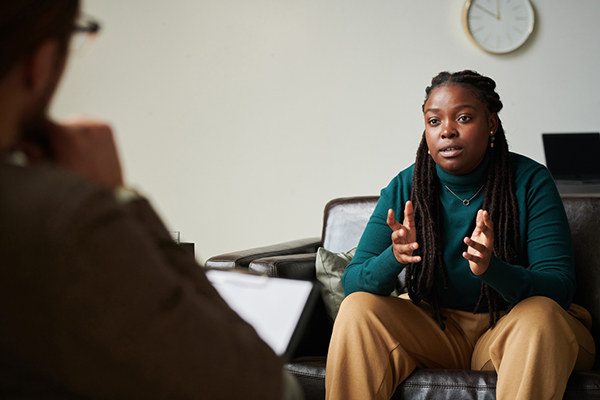 Woman speaking to psychiatrist