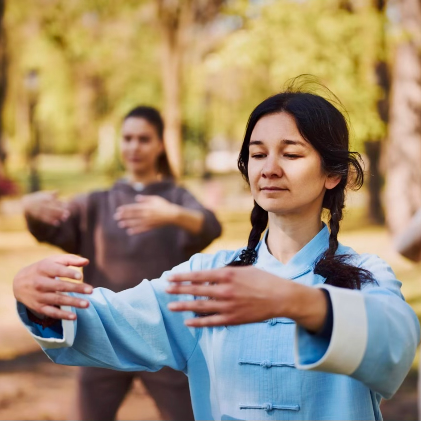 stock photo of a woman practicing qigong