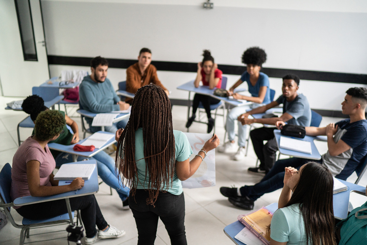 high school students sitting in a circle