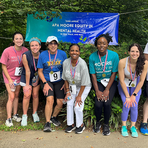 participants pose for a photo at the 5K